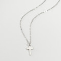 Mini sterling silver cross charm necklace gallery image