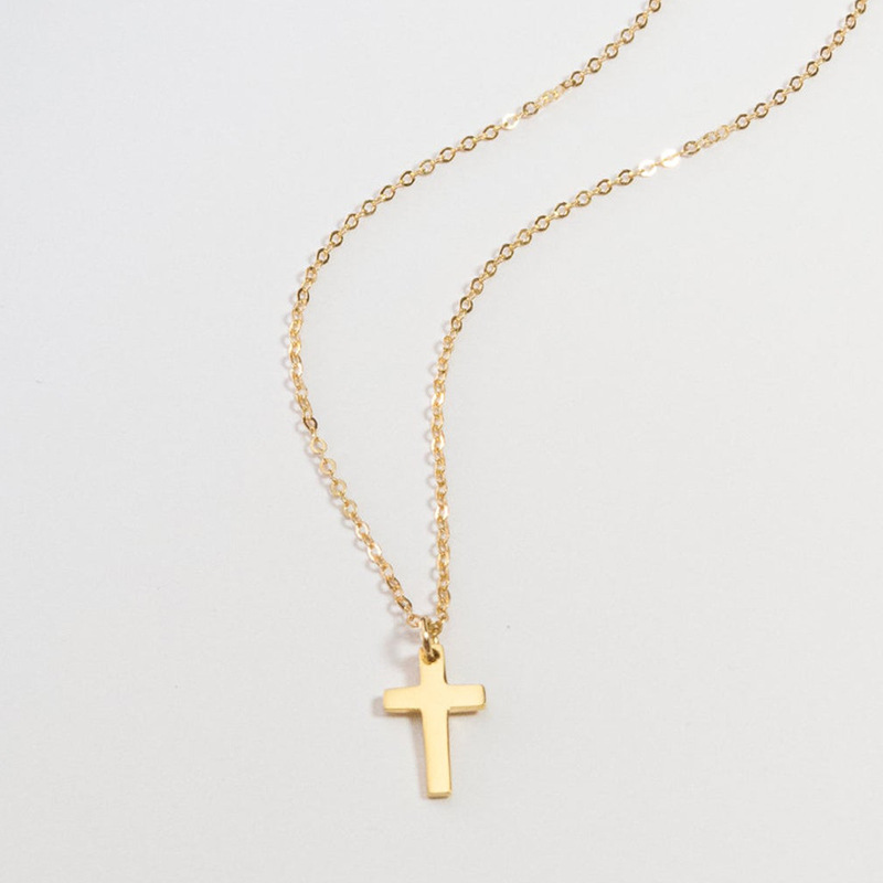 Mini sterling silver cross charm necklace gallery image