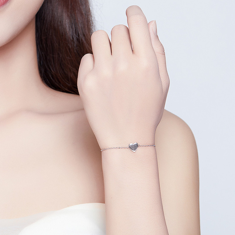 Mini heart bracelet in sterling silver