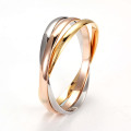 Three Tone Bangle Set Three-tone bangle set showing silver, yellow gold and rose gold bangles