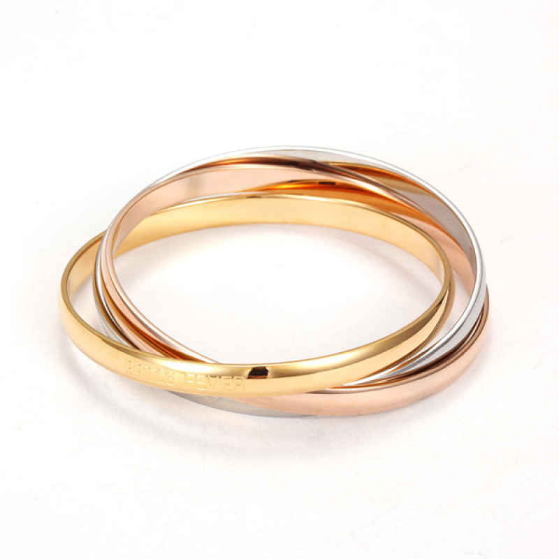 Three Tone Bangle Set Three-tone bangle set with silver, yellow gold and rose gold colours