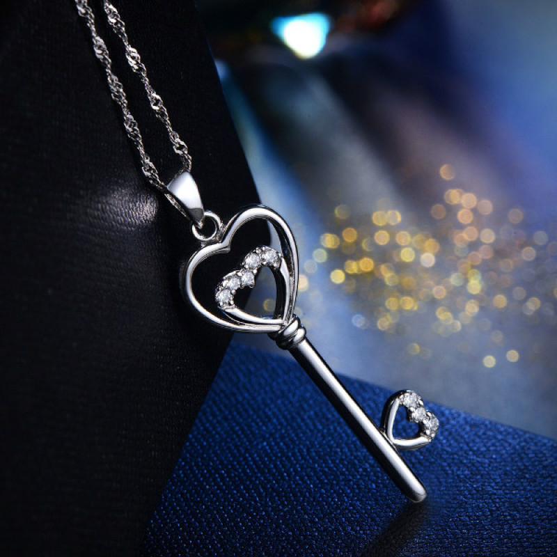 Sterling Silver Double Heart Key Pendant Necklace Sterling silver key pendant necklace with a double-heart detail
