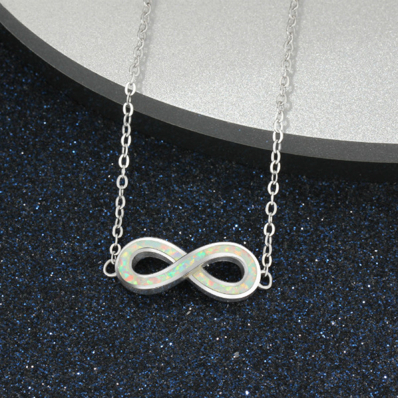 White opal infinity bracelet with personalised engraving in sterling silver