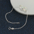 White opal infinity bracelet with personalised engraving in sterling silver