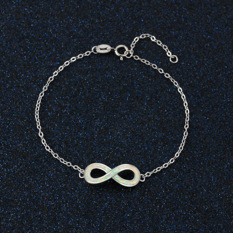 White opal infinity bracelet with personalised engraving in sterling silver