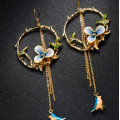 Enamel Flower and Bird Tassel Drop Earrings Long tassel hook drop earrings with enamel flower and bird