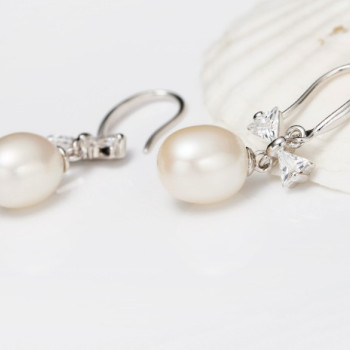 Freshwater Pearl Earrings On Sterling Silver Hooks With Bow Freshwater Pearl Earrings On Sterling Silver Hooks With Bow
