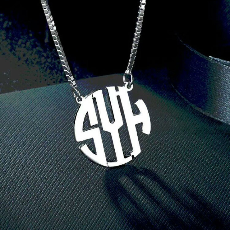 Round Monogram Initial Necklace Round monogram initial necklace with a cut-out scripted pendant