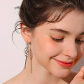 Geo Tassel Long Drop Earrings Long tassel drop earrings with geometric pendants