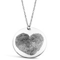 Personalised sterling silver circle pendant engraved with a fingerprint