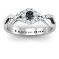 Braided Floral Cluster Ring with Shoulder Accents Braided floral cluster ring with a round centre stone and stone-set twisted shoulders