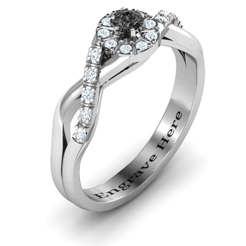 Braided Floral Cluster Ring detail view Braided floral cluster ring with round centre stone and shoulder accents