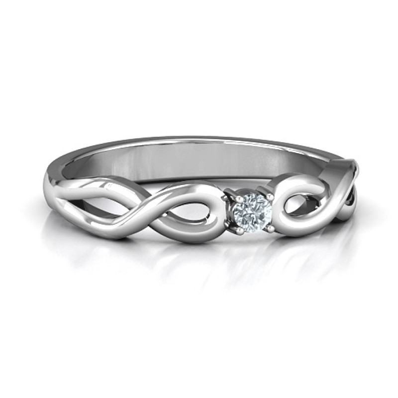 Classic Solitaire Ring with Infinity Band Classic solitaire ring with infinity band and round centre stone