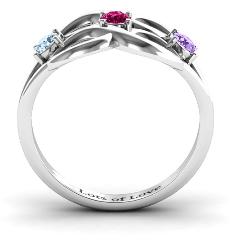 Double infinity ring with three round centre stones