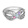 Forever Filigree Infinity Ring Forever Filigree Infinity Ring with a filigree infinity symbol and round centre stones