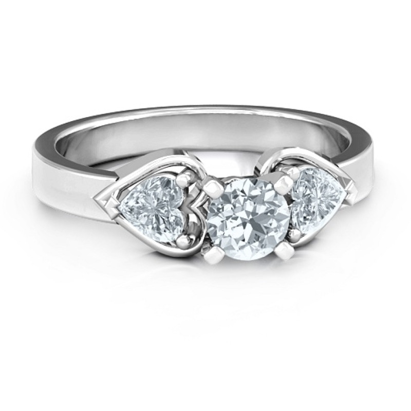 Hearts and Stones Solitaire Ring Hearts and Stones Solitaire Ring with round centre stone and heart-shaped side accents