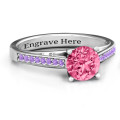 Large Round Solitaire Ring with Channel Set Accents Large round solitaire ring with channel-set accent stones
