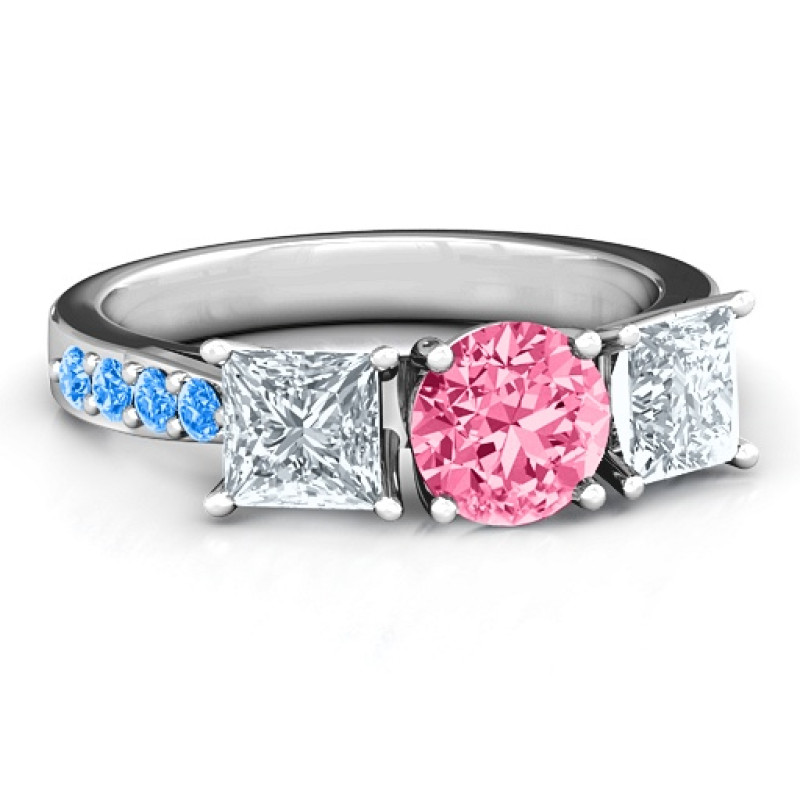 Three stone eternity ring with round centre stone, princess-cut side stones and twin accent rows