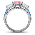 Three stone eternity ring with round centre stone, princess-cut side stones and twin accent rows