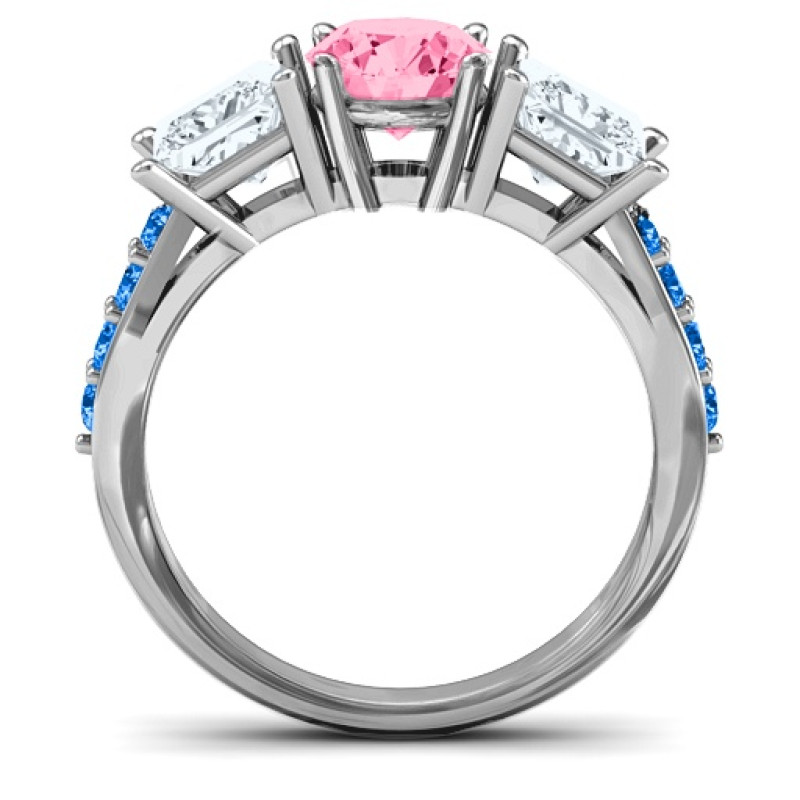 Three stone eternity ring with round centre stone, princess-cut side stones and twin accent rows