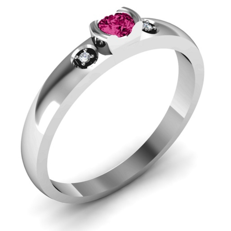 Open Bezel Ring with Accent Stones Open bezel ring with round centre stone and two accent stones
