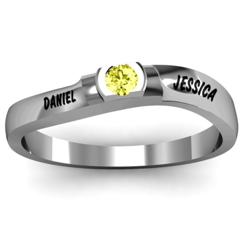 Open Bezel Set Swirl Ring Open Bezel Set Swirl Ring with curved swirl band and round centre stone