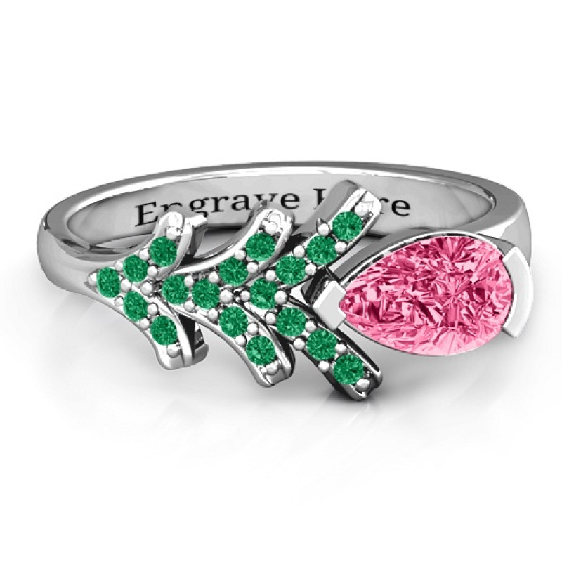 Pear Tree Ring with a pear-shaped zirconia centre stone and round accents