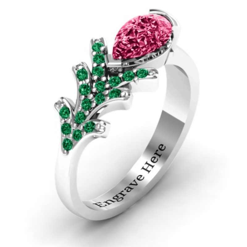 Pear Tree Ring with a pear-shaped zirconia centre stone and round accents