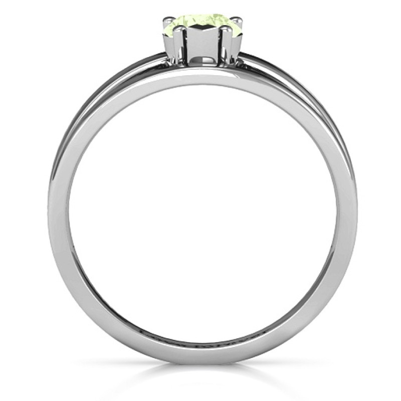 Pear With Flair Engraved Birthstone Ring Pear With Flair ring with a pear-cut stone and split-shank detailing