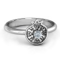 Pomegranate with Filigree Ring Pomegranate with filigree ring featuring a round centre stone