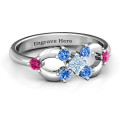 Princess Centre Infinity Ring Princess Centre Infinity Ring with square centre stone and surrounding round stones