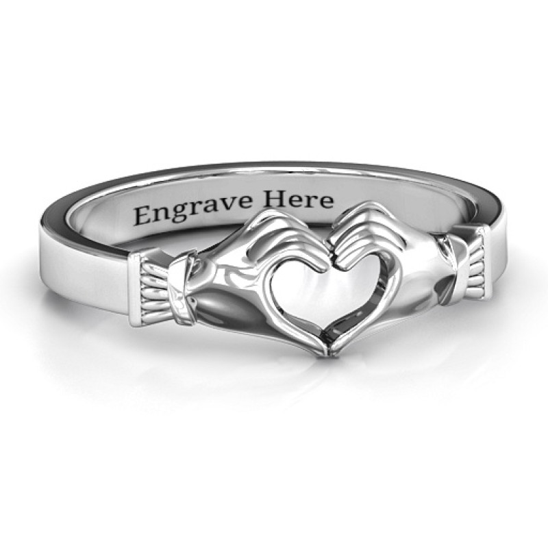 Sculpted Hand Heart Ring Sculpted hand heart ring with two hands forming a heart