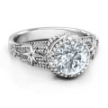 Showstopper Star Ring Showstopper Star Ring with round centre stone and star details
