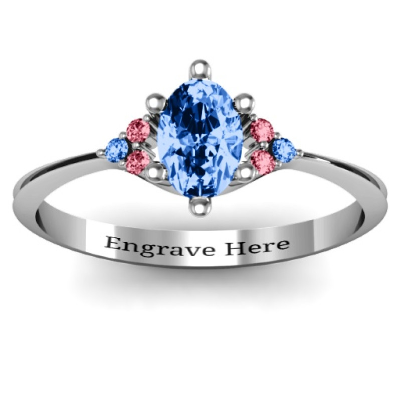 Solitaire oval ring with triple accent stones