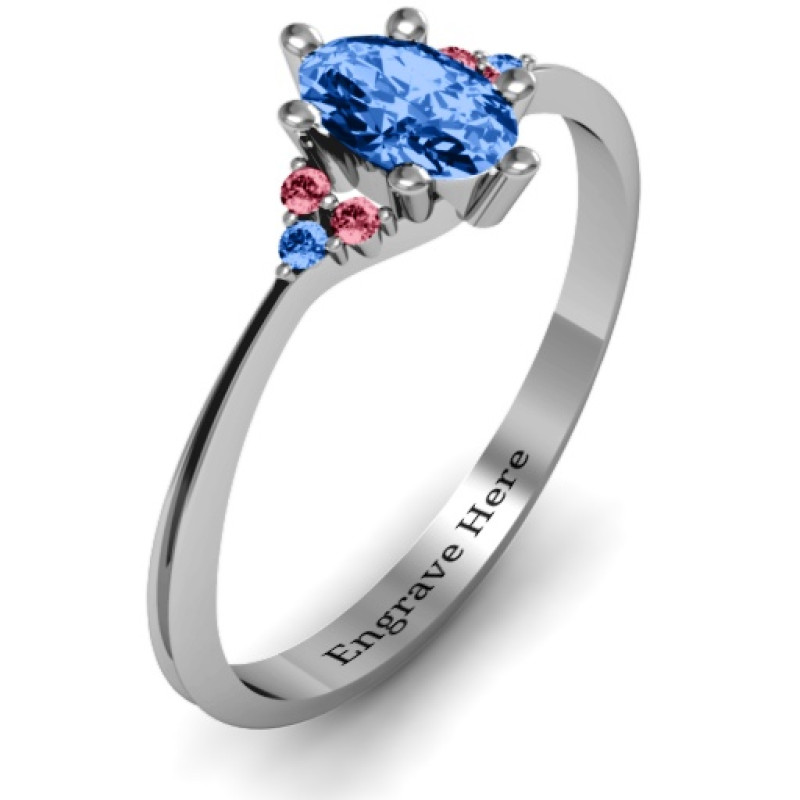 Solitaire oval ring with triple accent stones