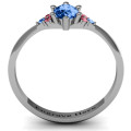 Solitaire oval ring with triple accent stones