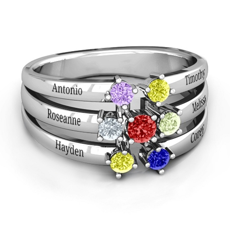 Spidra Round Centre Ring Spidra Round Centre Ring with a round centre stone and six side stones