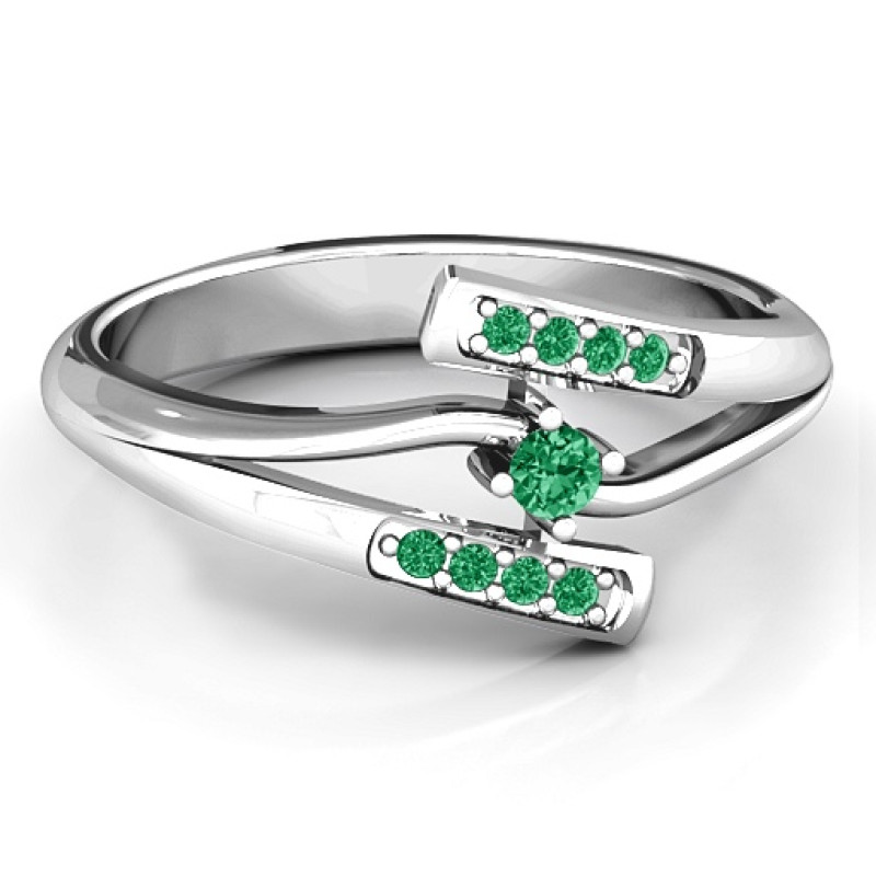 Double Bypass Channel Set Accent Ring Double bypass ring with a round centre stone and channel-set accent stones