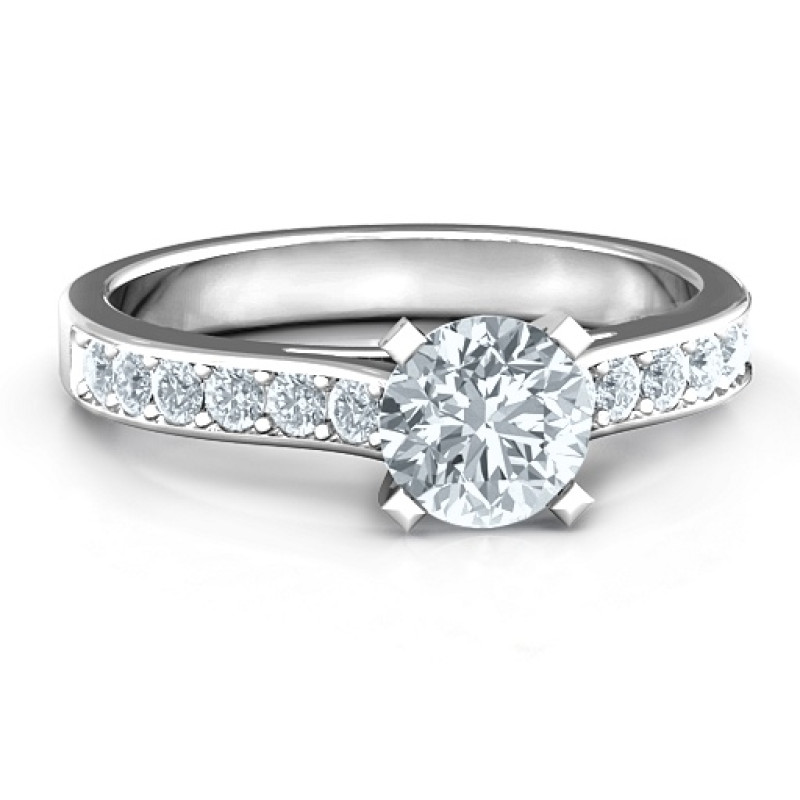 Elegant Duchess Ring with Shoulder Accents Elegant Duchess ring with round centre stone and channel-set shoulder accents