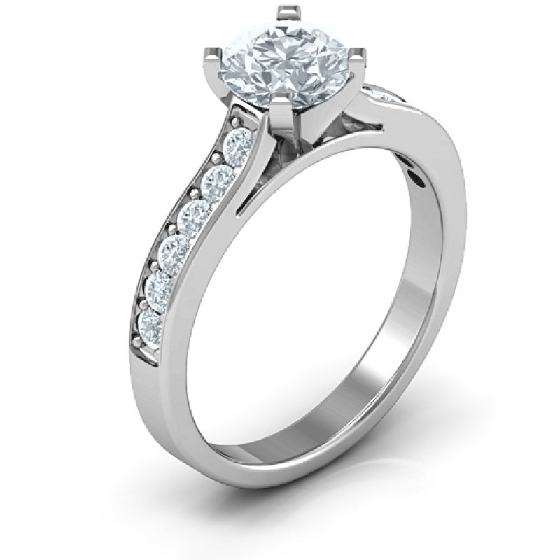 Elegant Duchess Ring with Shoulder Accents Elegant Duchess ring with round centre stone and shoulder accents