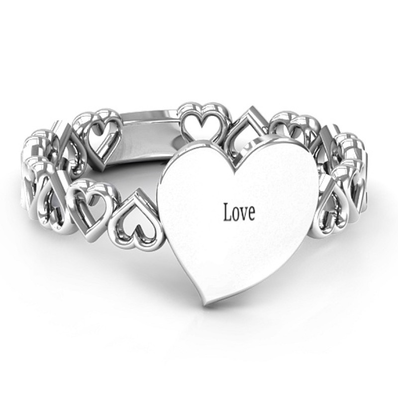 Engravable cut-out hearts ring with a polished central heart