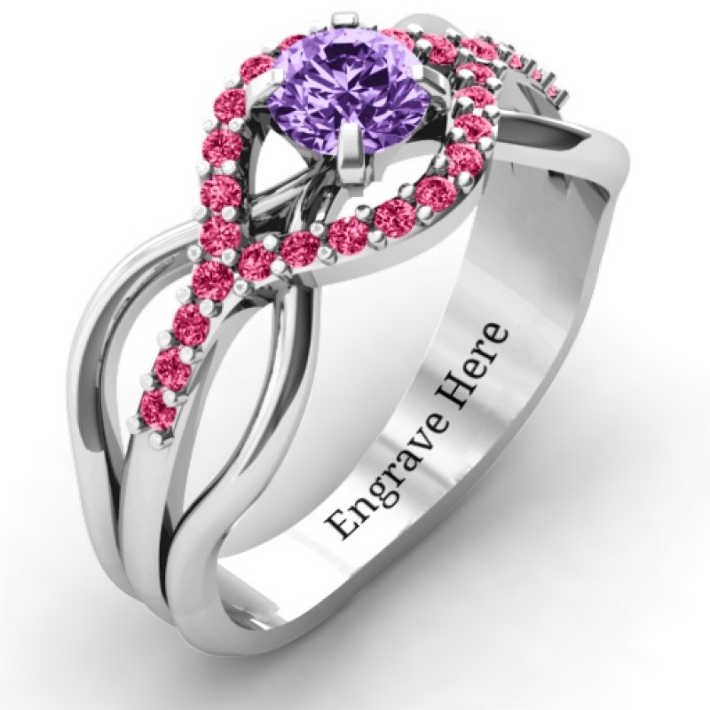 Fancy woven solitaire ring with an open crisscross band