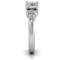 Flourish Engagement Ring Flourish engagement ring with a round centre stone and side stone clusters