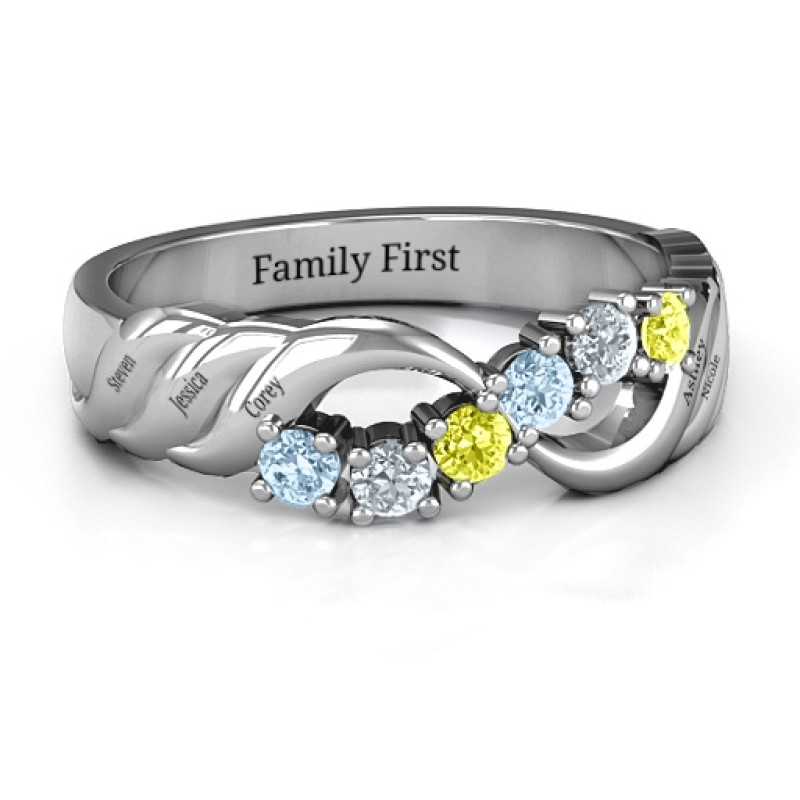 Infinity and wave ring with six round stones