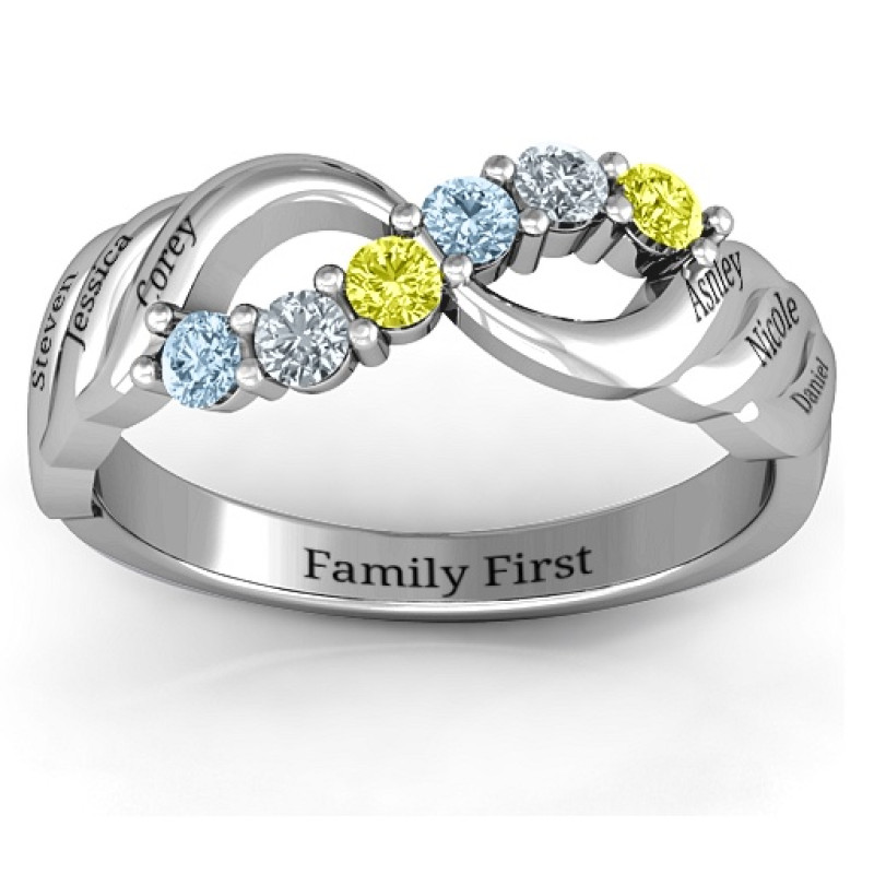 Infinity and wave ring with six round stones