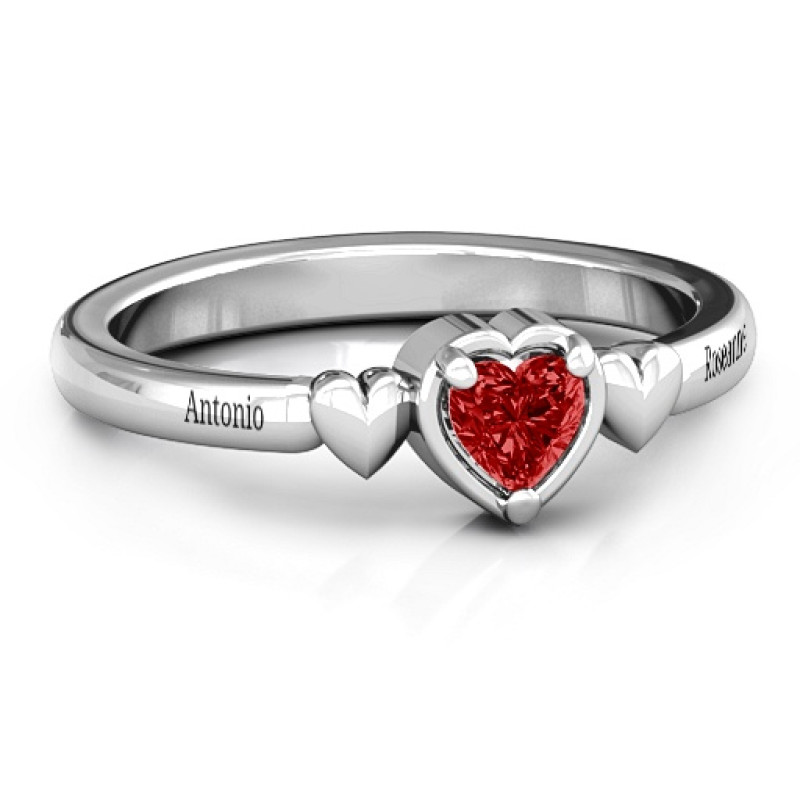Triple Heart Ring with a heart-cut centre stone and two heart details