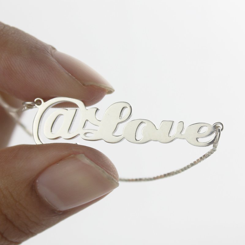 @ Symbol Name Necklace Detail Detail view of the personalised @ symbol name necklace