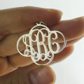 Clover Monogram Necklace View Personalised cut-out clover monogram necklace in sterling silver