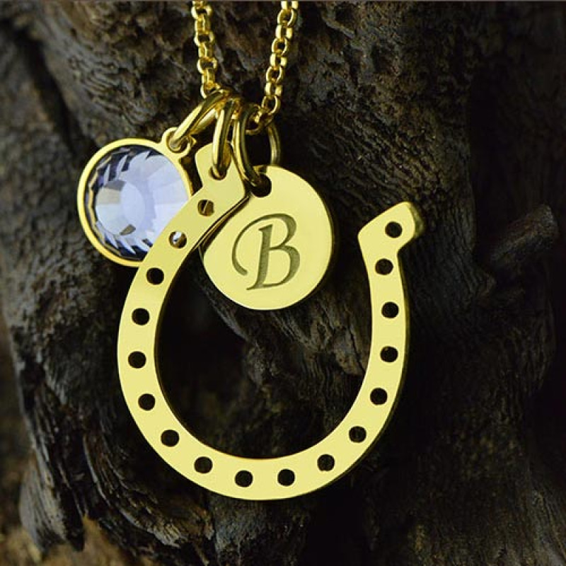 Personalised horseshoe pendant necklace with initial charm