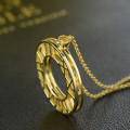 Double-circle Roman numeral necklace detail image
